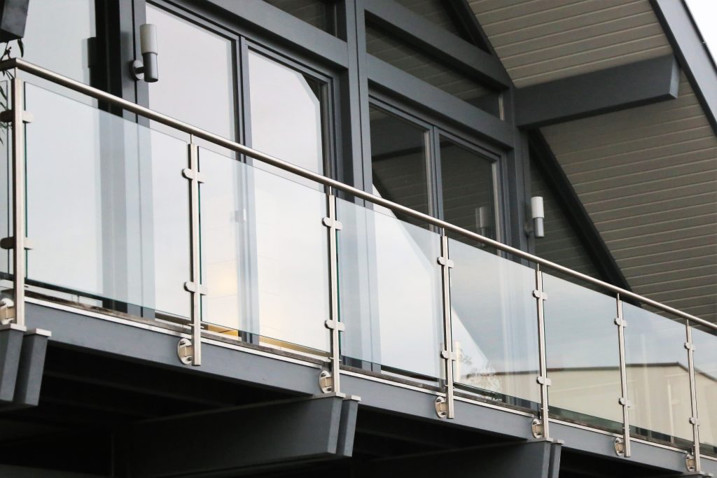 balcony railing made of glass and stainless steel